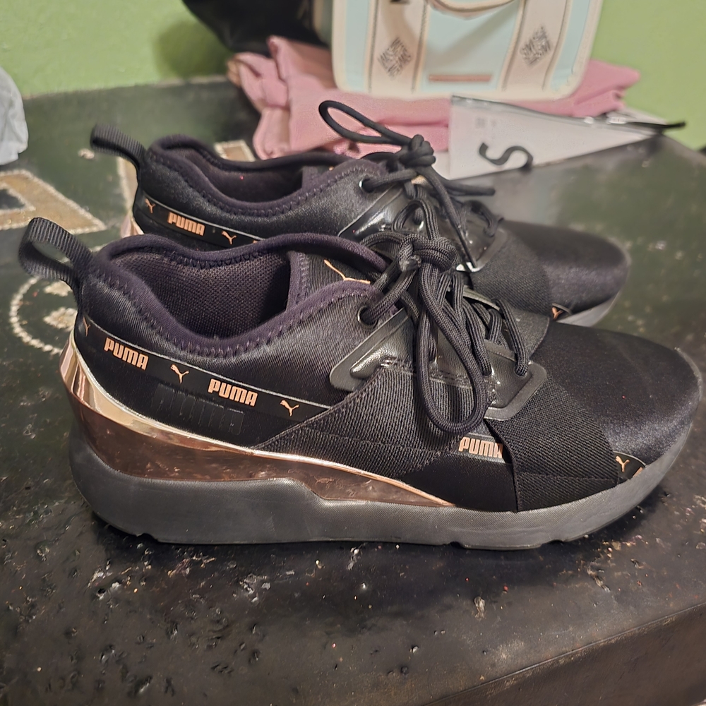 Puma Black Sneakers with Gold Highlights